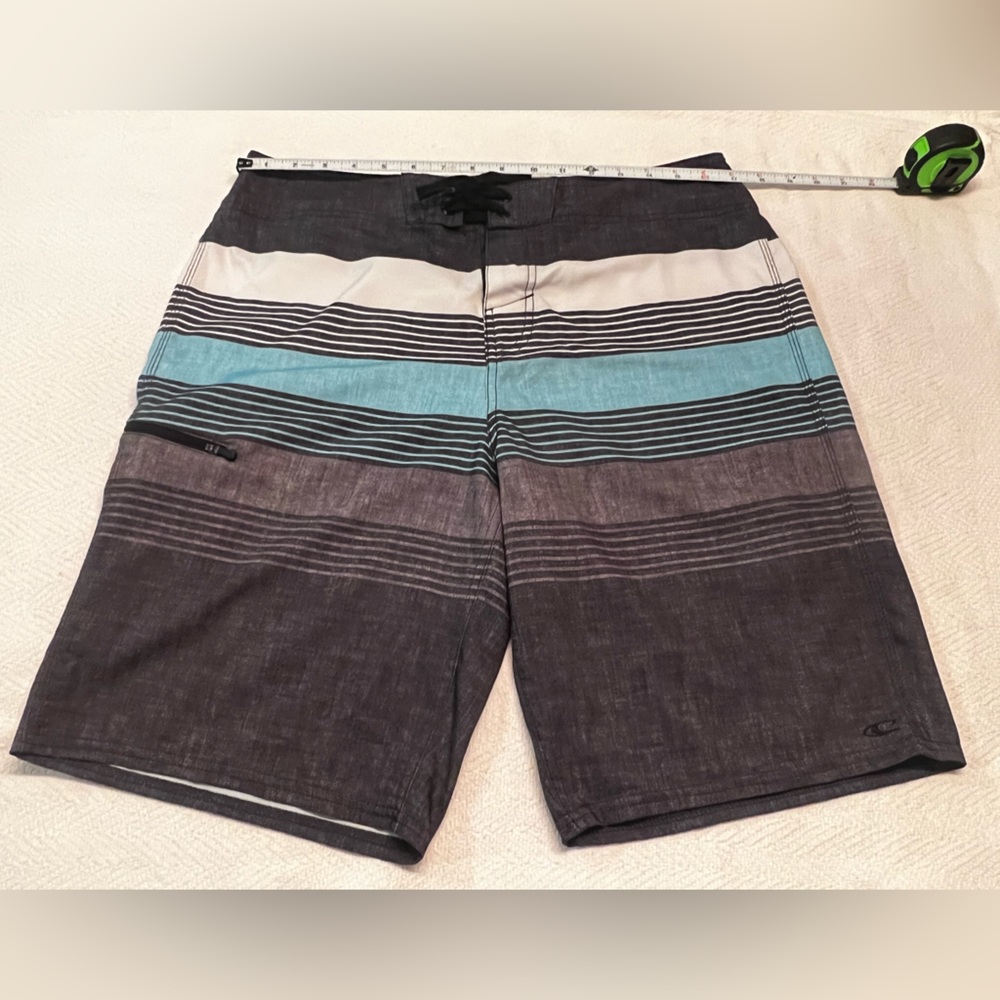 O’Neill gray, blue and white used board shorts size 33